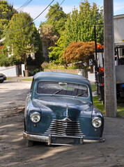 Earthquake - Vintage car in sea of Liquifaction.