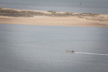 Selective blur on a bateau ostreicole plate, an oyster farming boat, sailing in the atlantic ocean waters, in bassin d'arcachon bay, in Southwestern France, a place known for oyster culture. ..