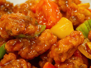Close up shot of sweet and sour pork