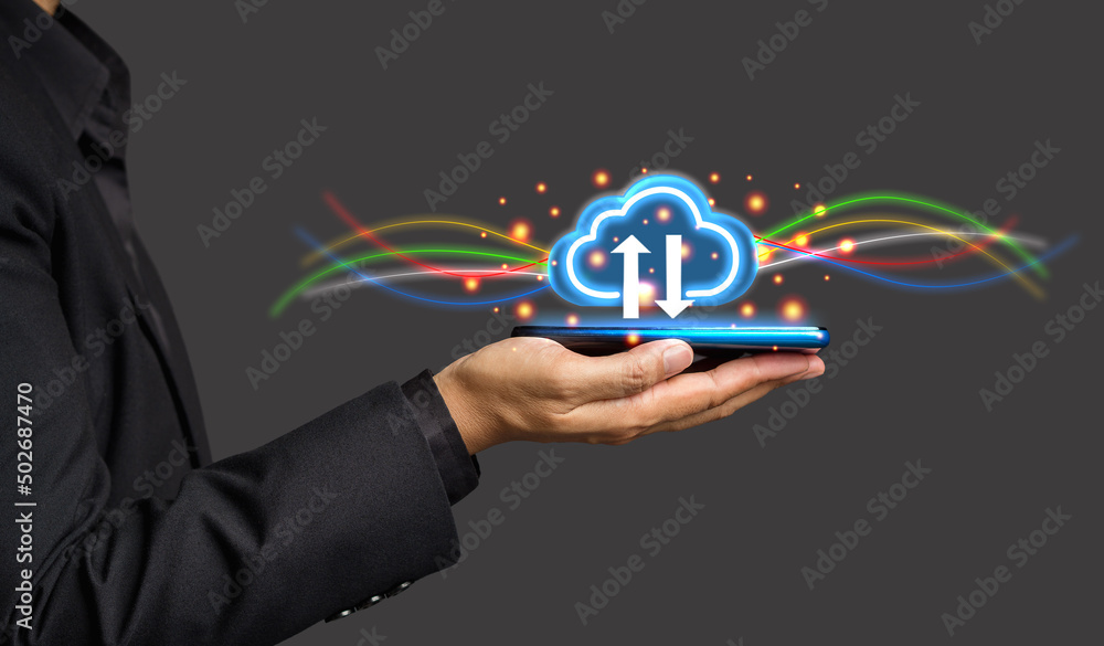 Poster businessman hand holding virtual cloud computing icon in the palm while standing on a gray backgroun