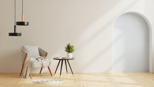 Modern minimalist interior with an armchair on empty plaster wall background.