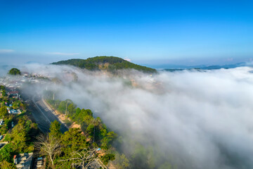 Aerial view of the town in the early morning mist is beautiful in the highlands of Da Lat, Vietnam
