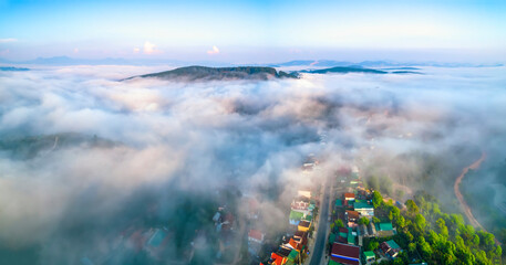 Aerial view of the town in the early morning mist is beautiful in the highlands of Da Lat, Vietnam