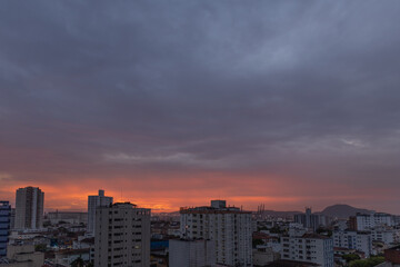 time clouds over city