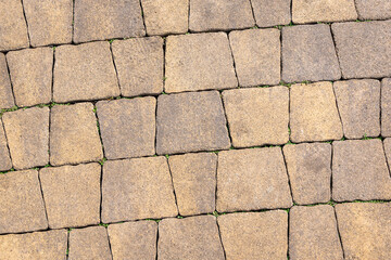 Tile road under a stone, granite.