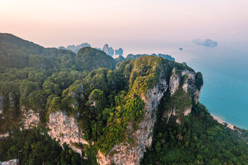 summer view of rocky mountains and sea in a tropical morning