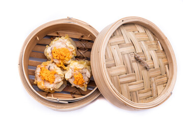 Freshly steamed siew mai or shaomai is poular Cantonese Chinese dim sum delicacy