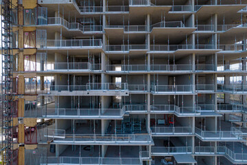 Empty construction site, progress stops due residential construction workers protesting and on strike, asking compensation, because of rising cost of living. Crises along with housing shortage.