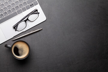Office desk table with laptop and coffee