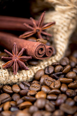 Coffee on the roasted coffee beans background