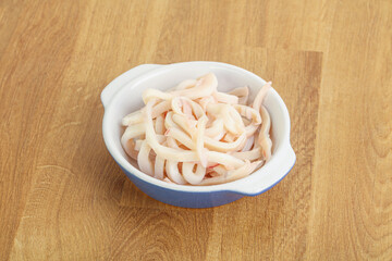 Marinated squid strips in the bowl