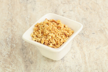 Crunched roasted peanut in the bowl