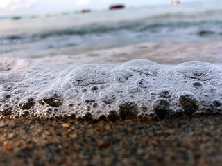 Fototapeta na wymiar stone on the beach and water bubble.