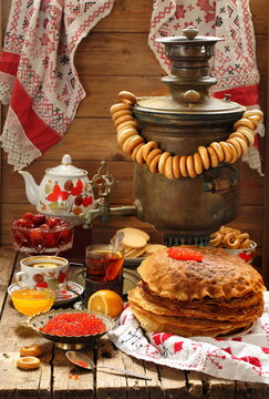 Pancakes with red caviar and samovar tea