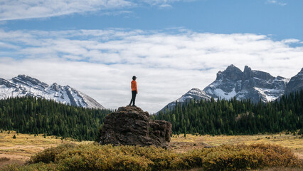 Female hiker enjoying the view on mountains, Mt Assiniboine Provincial Park, Canada