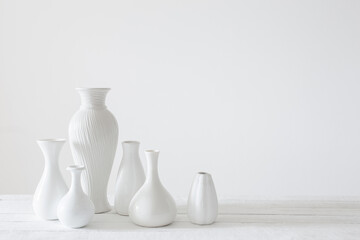 ceramic white vases on white background