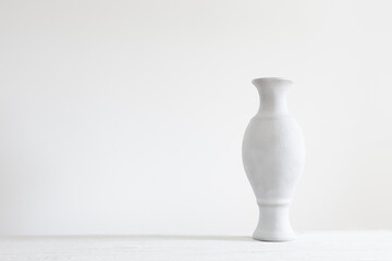 ceramic white vase on white background