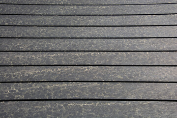 Pollen on black patio garden furniture table in april and may in germany