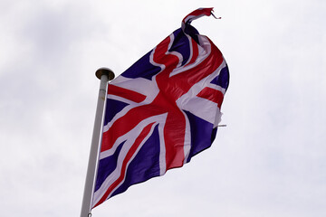 england flag english wave over a cloudy sky United Kingdom