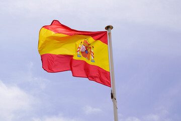 flag spain spanish flag National state flag on wind mat with blue cloud sky