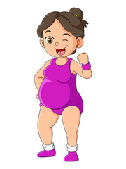 The sporty pregnant mother is doing the sport