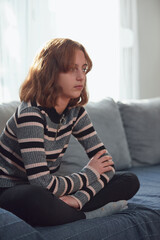Obraz premium Teenage girl being bored and difficult at home.