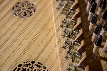 Qanun Middle Eastern instrument up close with grain and out of focus