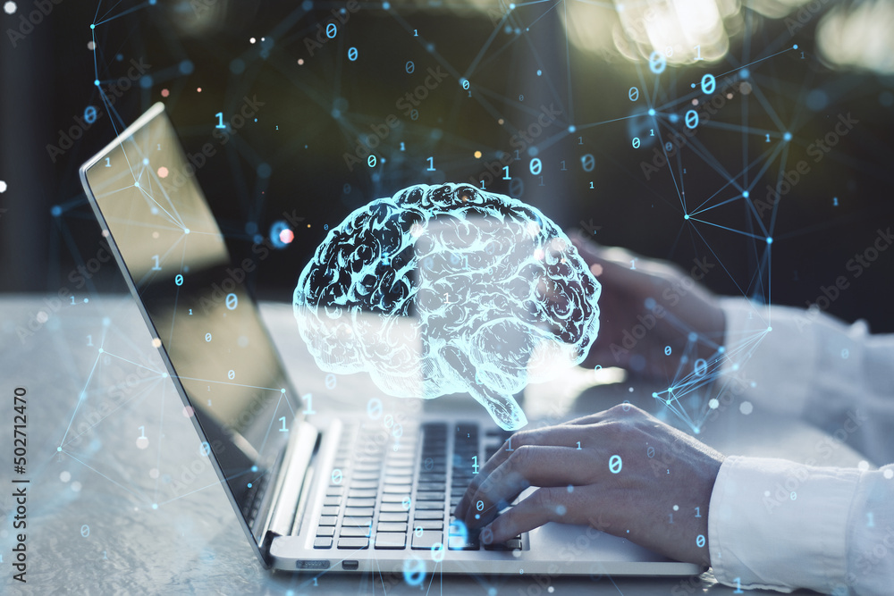 Poster close up of businessman hands using laptop with creative polygonal brain hologram on blurry backgrou