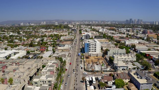 Aerial Forward Shot Of Men Riding Motorbikes At Dgr Event On Sunny Day - Los Angeles, California