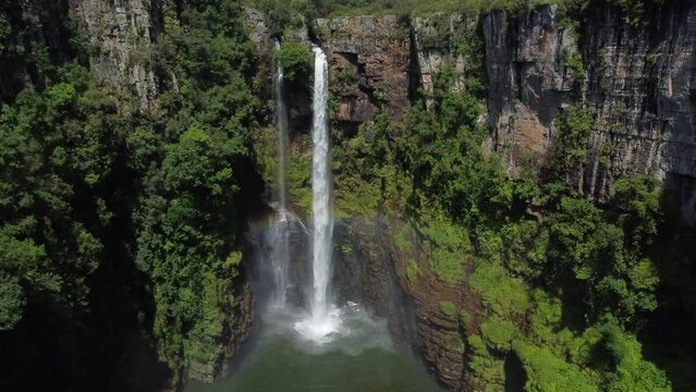 Drone shot of Mac Mac Fall in South Africa - drone is descending in front of the waterfall. Snippet could ideally be used for travel or hiking related videos or South Africa movies.