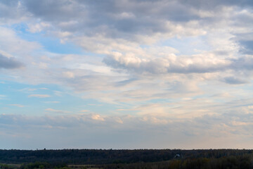 Fototapeta na wymiar Beautiful clouds in the blue sky. Natural atmospheric background.