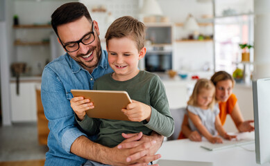 Distance learning, online education, home work concept. Family with digital devices at home.