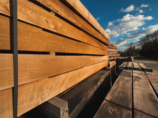 Stacked railway sleepers made of oak hardwood material