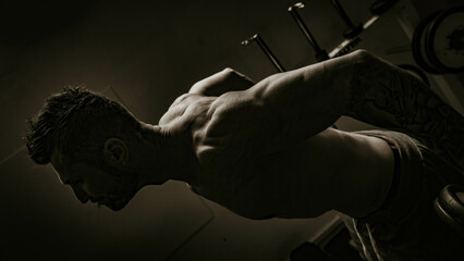 strong back of man at the gym