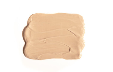 Foundation with smears as a sample on a white background. Makeup cosmetics. Tone cream. Concealer texture.