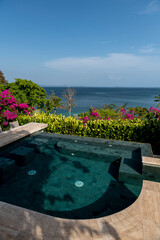 Fototapeta na wymiar Villa in the tropics on the ocean pacific coast with an Infinity pool and view out to sea, Panama, Central America