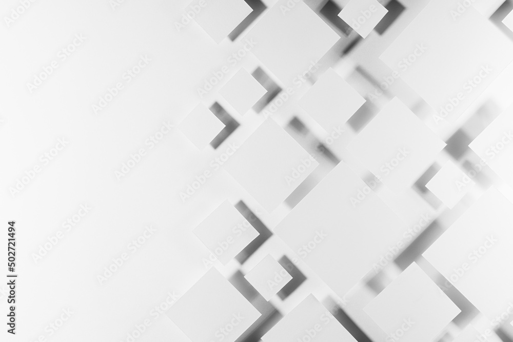 Poster grey geometric texture with flying rhombuses in hard light with contrast gradient dark shadows as bo