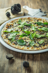 Truffle Pizza on Wooden Table