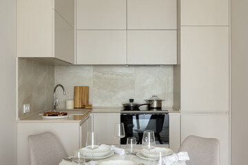 kitchen interior in beige tones,  interior of a modern apartment