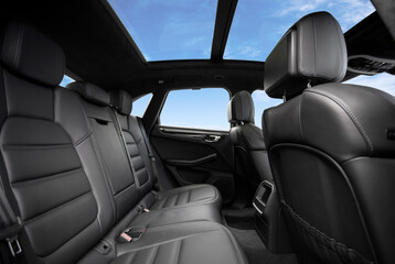 Rear seats covered with fabric in a luxury car - 502724434