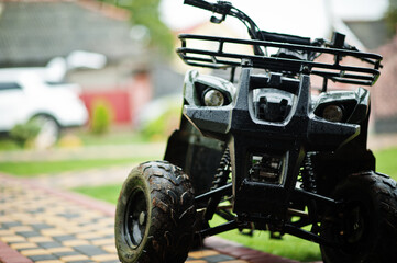 Four-wheller ATV quad bike in home use.