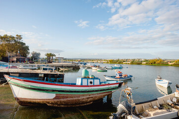 Naklejka na ściany i meble Fishing boats at the mooring in front of Fuseta in the Algarve