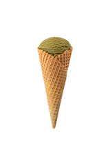 Green ice cream in a waffle cone isolated on white.