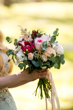 Wedding Bouqet In Woman Hands. Beautiful Green Floral Bouqet.