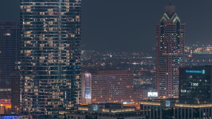 Aerial view of Dubai city night timelapse in downtown district.