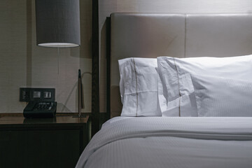 Fototapeta na wymiar Elegant and comfortable home and hotel bedroom interior.