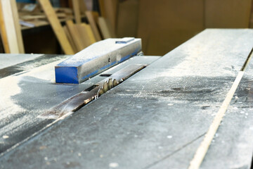 Close-up of a circular saw in a joinery. Furniture manufacture.