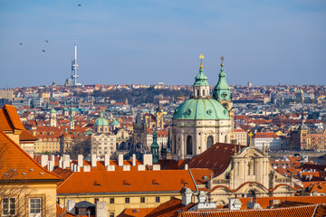 Fototapeta na wymiar Houses with traditional red roofs in Prague, Panoramic city skyline, Scenic aerial panorama of the Old Town architecture in Prague, Czech Republic
