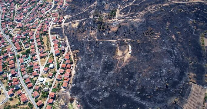 Aerial view of aftermath destruction in city of an fire explosion, bushfire, war