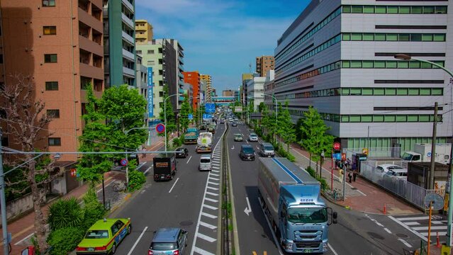 A timelapse of downtown street at Kanpachi avenue in Tokyo wide shot